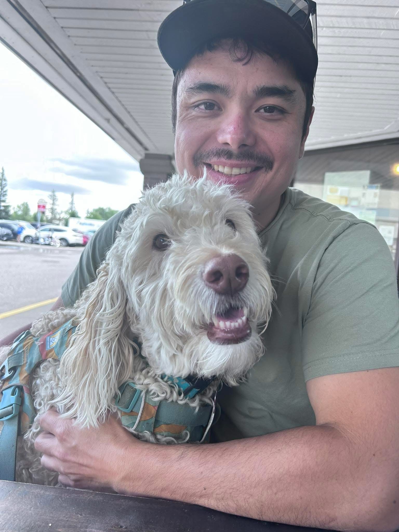 Joey Motokado and his dog Kittle